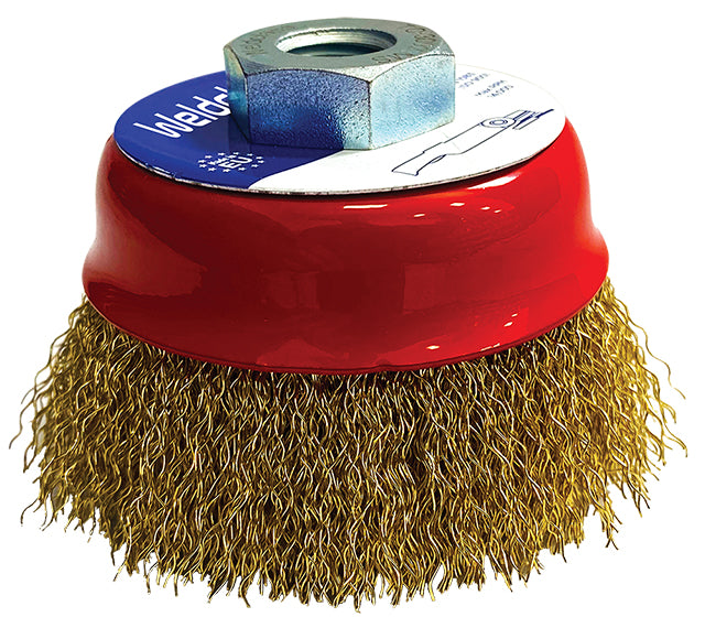 Wire brush with red base and brass bristles on a white background